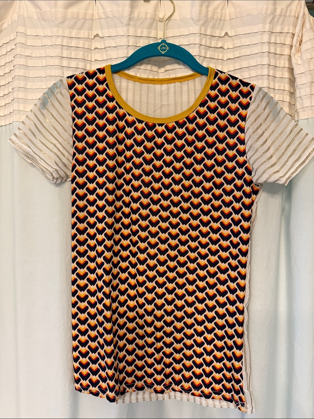 Geometric Heart Print Tee in Navy, Gold, Yellow, Orange, & White